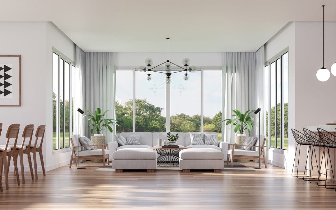 Bright and spacious living room with large windows, stylish furniture, and contemporary decor.