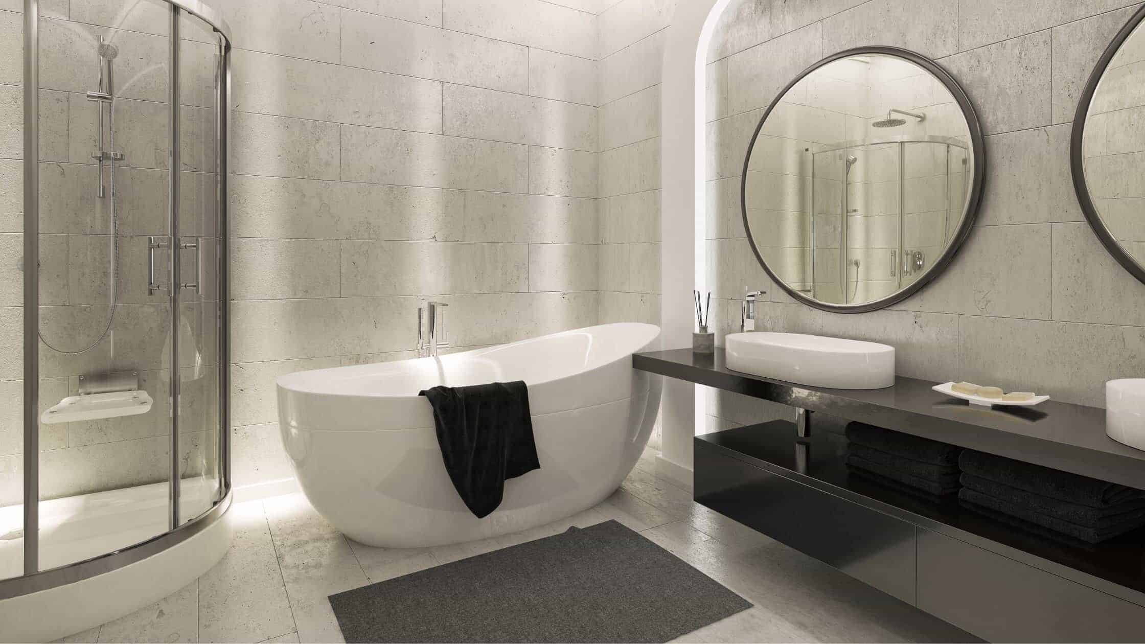 Elegant modern bathroom with bathtub, shower, and stylish mirrors.