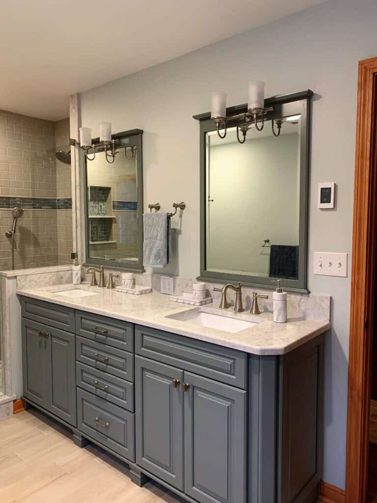 Dual sink bathroom vanity with spacious storage and modern fixtures.