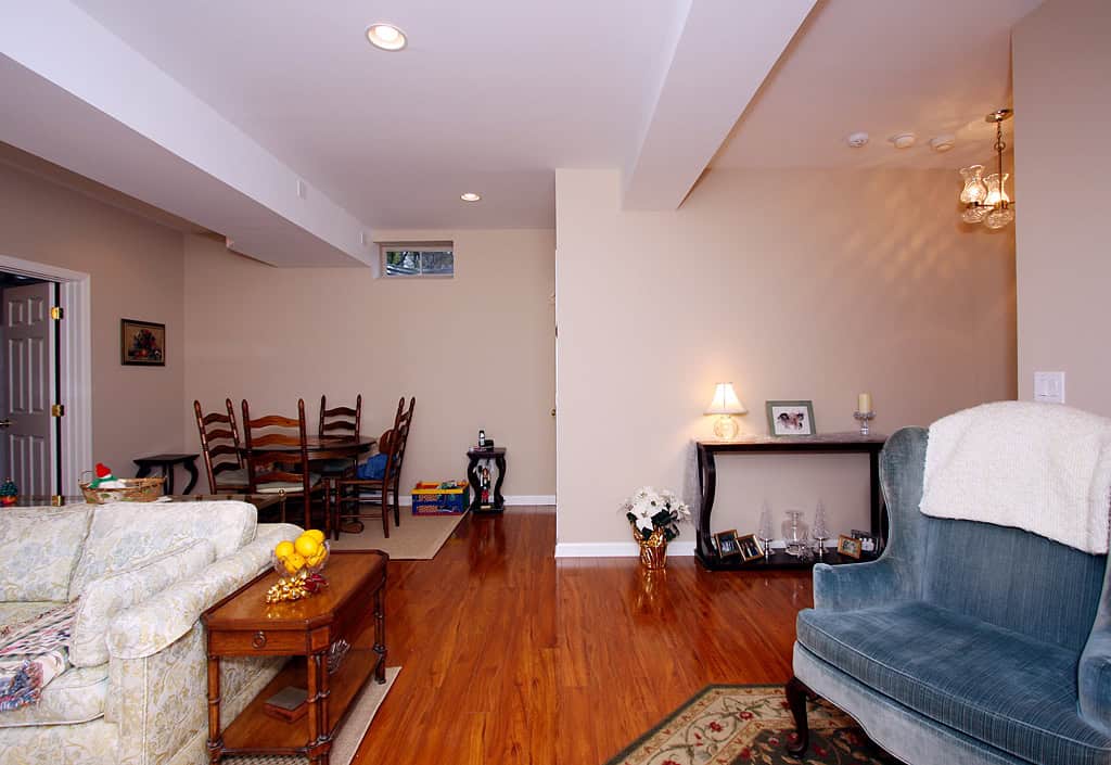 Cozy living room with hardwood floors and elegant furniture.