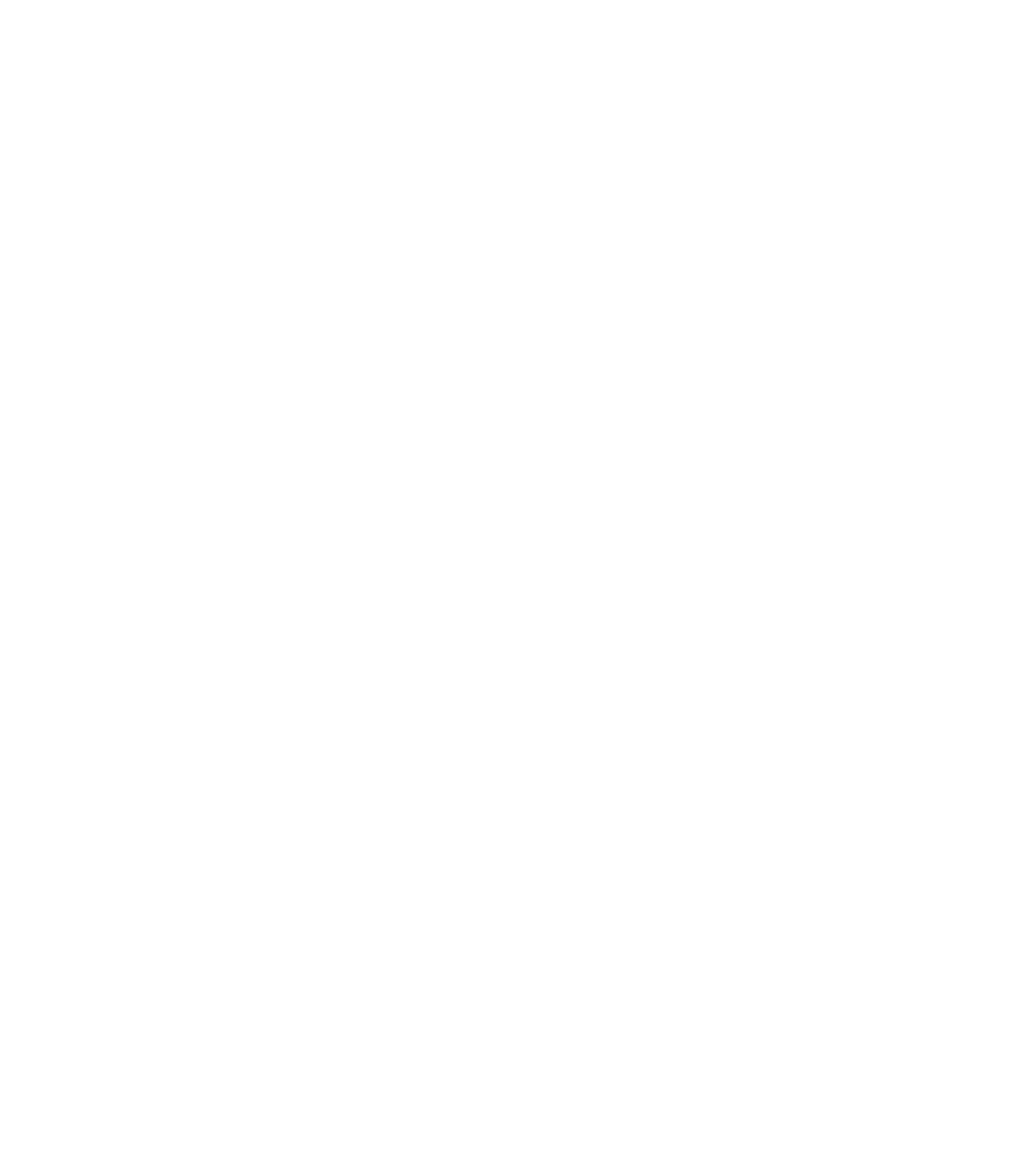Construction worker holding lumber, wearing safety helmet, on a building site.